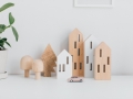 Wooden House Toys | Wooden Desk Accessories | A Frame Desk | Neutral Desk Accessories | White Desk Chair | Statement Wall Light | A modern neutral millennial pink bedroom for children with handmade furniture, personalised artwork and statement lighting